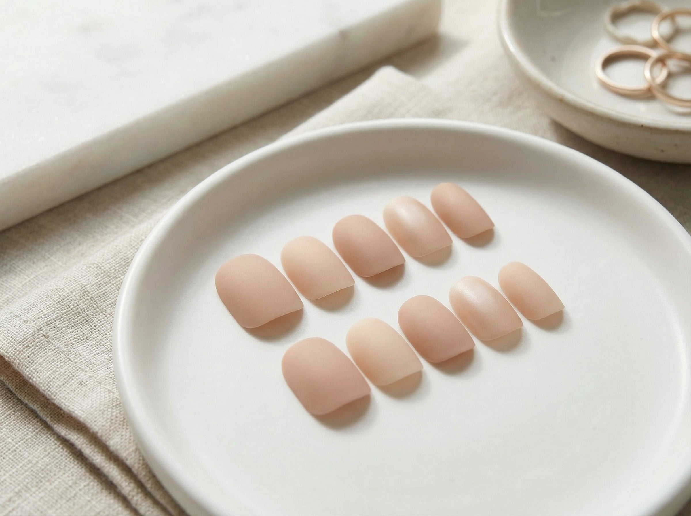 Minimalist Nude press-on nails detail shot