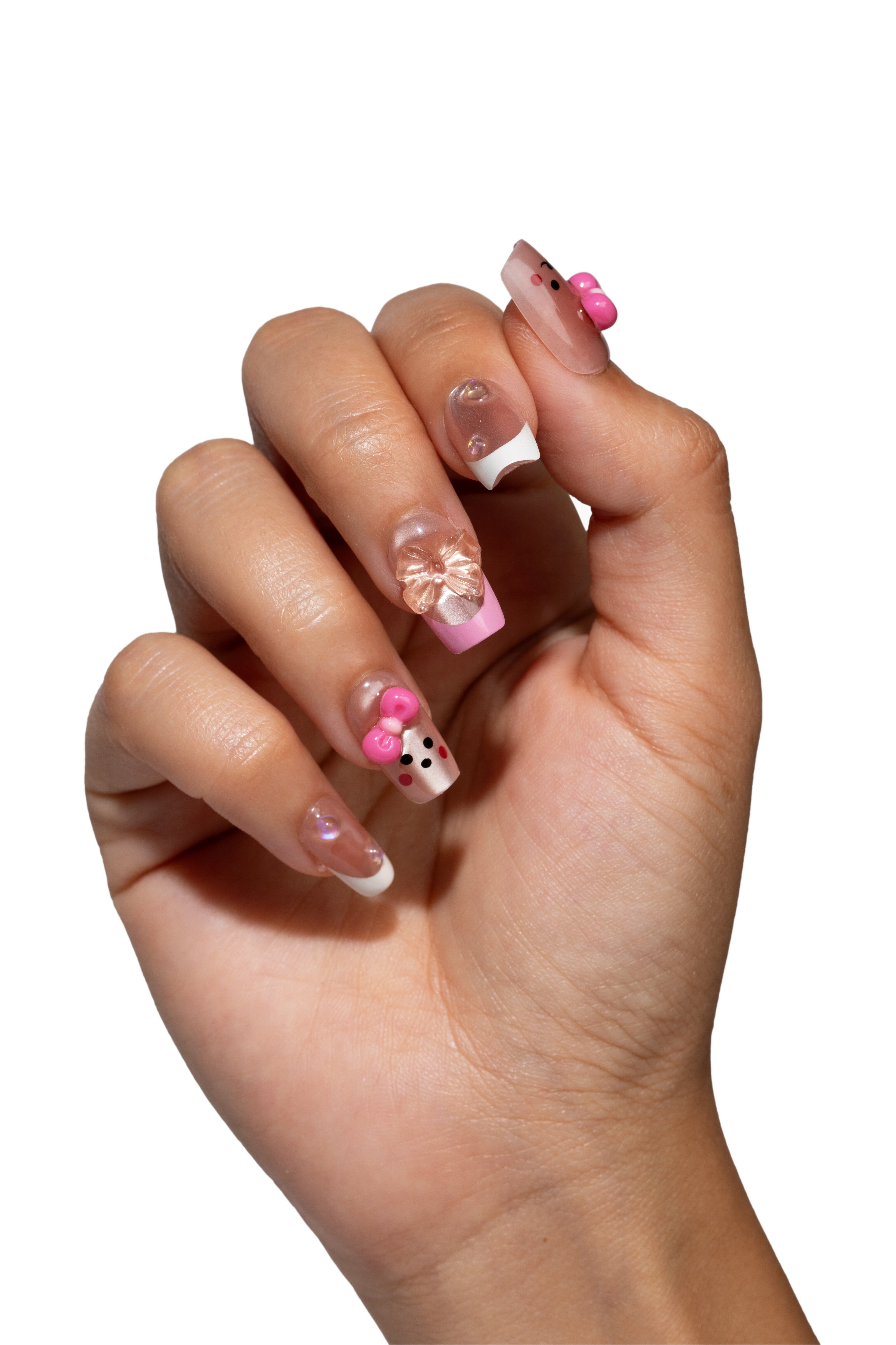 Pink bear press-on nails worn on a single hand